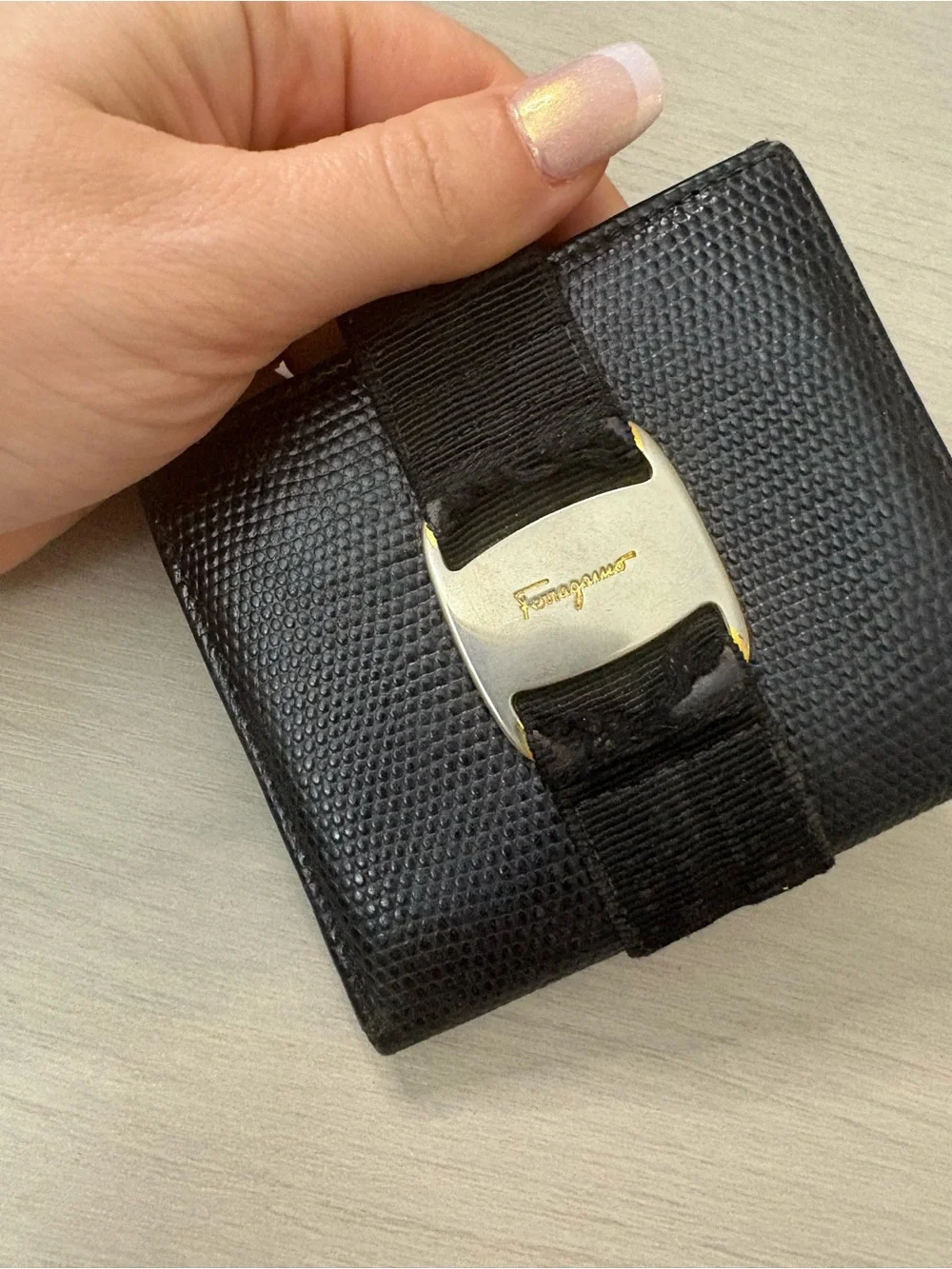 Salvatore Ferragamo Black Textured Leather Wallet with Gold Buckle